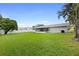 Spacious backyard with lush lawn and privacy fence at 1412 Ruthbern Rd, Daytona Beach, FL 32114