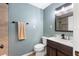 Updated bathroom with a modern vanity and stylish fixtures at 1412 Ruthbern Rd, Daytona Beach, FL 32114