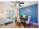 Bright dining area with table and chairs, and sliding glass doors leading to a patio at 1412 Ruthbern Rd, Daytona Beach, FL 32114
