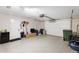 Garage with ample storage space and an attached door at 1412 Ruthbern Rd, Daytona Beach, FL 32114