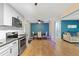 Modern kitchen with stainless steel appliances and granite countertops at 1412 Ruthbern Rd, Daytona Beach, FL 32114