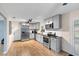 Modern kitchen with stainless steel appliances and granite countertops at 1412 Ruthbern Rd, Daytona Beach, FL 32114