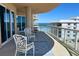 Relax on this balcony with beautiful ocean views and comfortable seating area at 3703 S Atlantic Ave # 501, Daytona Beach Shores, FL 32118