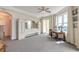 Spacious bedroom featuring large windows with lots of natural light and balcony access at 3703 S Atlantic Ave # 501, Daytona Beach Shores, FL 32118