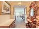 Elegant foyer featuring vintage furnishings and access to a spacious living area at 3703 S Atlantic Ave # 501, Daytona Beach Shores, FL 32118