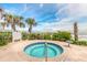 A community hot tub area surrounded by lush greenery and offering a tranquil setting with ocean views at 3703 S Atlantic Ave # 501, Daytona Beach Shores, FL 32118