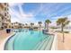 Outdoor swimming pool features tile accents, comfortable lounge chairs, and views of the beach and ocean at 3703 S Atlantic Ave # 501, Daytona Beach Shores, FL 32118