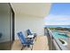 Balcony featuring ocean view with lounge chairs overlooking a pool and sundeck at 2555 S Atlantic Ave # 207, Daytona Beach Shores, FL 32118