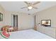 This bedroom offers a tv and ceiling fan at 2555 S Atlantic Ave # 207, Daytona Beach Shores, FL 32118
