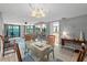 Dining room with seating for four is conveniently located near kitchen and living room with a balcony at 2555 S Atlantic Ave # 207, Daytona Beach Shores, FL 32118