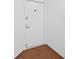 Image of a white apartment door with a silver door handle and unit number 207 at 2555 S Atlantic Ave # 207, Daytona Beach Shores, FL 32118