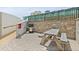 Community grilling area with a picnic table, grill, and block wall in an outdoor location at 2555 S Atlantic Ave # 207, Daytona Beach Shores, FL 32118