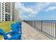 Beachfront building with outdoor seating area and access to the ocean view at 2555 S Atlantic Ave # 207, Daytona Beach Shores, FL 32118