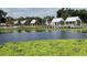 Picturesque view of covered docks along the water's edge at 2600 Shortleaf, Kissimmee, FL 34746