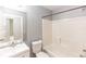 Clean bathroom featuring tub/shower combo, modern vanity, and tile floors at 250 Hickory Ave, Orange City, FL 32763