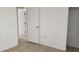 Neutral bedroom featuring tile flooring and natural light at 250 Hickory Ave, Orange City, FL 32763