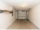 Spacious one-car garage with room for storage and a workbench, offering convenience and functionality at 250 Hickory Ave, Orange City, FL 32763