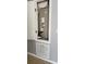 HVAC system located in wall with access panel and lower vent at 250 Hickory Ave, Orange City, FL 32763