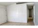 Bright hallway with tiled floors, neutral color scheme, and modern fixtures at 250 Hickory Ave, Orange City, FL 32763