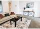 Living room with comfortable seating and console table at 561 Quail Valley Ct, Debary, FL 32713