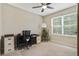 Home office with a desk, chair, and ample natural light at 811 Grand Park Ct, Deland, FL 32724