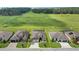 Aerial view of a single-Gathering home with a large backyard and surrounding houses at 9777 Sw 63Rd Loop, Ocala, FL 34481