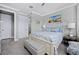 Comfortable bedroom with king bed and access to bathroom at 9777 Sw 63Rd Loop, Ocala, FL 34481