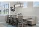 Breakfast nook with built-in banquette seating and a large chandelier at 9777 Sw 63Rd Loop, Ocala, FL 34481