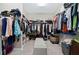Large walk-in closet with ample shelving and hanging space at 9777 Sw 63Rd Loop, Ocala, FL 34481