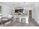 Modern kitchen featuring granite countertops, stainless steel appliances, and bar stool seating at 2126 7Th Ave, Deland, FL 32724