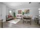 Open floor plan with comfortable living area and dining space next to an adjacent kitchen at 2126 7Th Ave, Deland, FL 32724