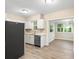 Kitchen area featuring stainless steel appliances and views into another room at 522 Powers Ave, Port Orange, FL 32127