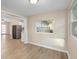 Bright eat in kitchen featuring stainless steel appliances, recessed lighting and new wood-look flooring at 522 Powers Ave, Port Orange, FL 32127