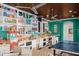 Fun game room with bright decor, ample storage, and a ping pong table for entertainment at 4 Broad Creek Cir, Ormond Beach, FL 32174