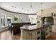 Gourmet kitchen with custom cabinetry, large island, and stainless steel appliances at 4 Broad Creek Cir, Ormond Beach, FL 32174