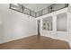 Open concept living space featuring second floor loft with railing at 4 Broad Creek Cir, Ormond Beach, FL 32174