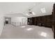Large loft area with built-in shelving, skylights, and plenty of space for recreation at 4 Broad Creek Cir, Ormond Beach, FL 32174