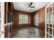 Well-lit office space featuring a large window, custom millwork and tile flooring at 4 Broad Creek Cir, Ormond Beach, FL 32174