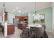 Kitchen with island, stainless steel appliances, and breakfast nook at 4345 Heath Land Ln, Lake Wales, FL 33859