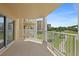 Spacious balcony overlooking the lush landscape, perfect for relaxation and enjoying the scenery at 4650 Links Village Dr # C303, Ponce Inlet, FL 32127