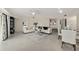 Spacious living room boasts an open floor plan, tile floors, contemporary furnishings, and modern decor at 4650 Links Village Dr # C303, Ponce Inlet, FL 32127