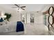 Bright main bedroom with a large bed, ensuite bath, and private balcony access at 4650 Links Village Dr # C303, Ponce Inlet, FL 32127
