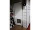 View of the back door entrance, exterior paint, shelving and organization of outdoor supplies at 532 W Wisconsin Ave, Deland, FL 32720