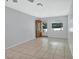 Open living space with an inviting entryway and natural light from the nearby window at 532 W Wisconsin Ave, Deland, FL 32720