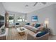 Bright living room featuring neutral tones, plush seating, and stylish decor at 532 W Wisconsin Ave, Deland, FL 32720