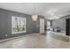 Bright dining room with tile floors and chandelier at 817 S Benton Lake S Dr, Deland, FL 32724