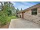 Concrete patio adjacent to home's exterior wall at 105 Scenic Magnolia Dr, Deland, FL 32724