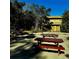 Community park area with picnic tables and plenty of shade at 600 N Boundary Ave # 106D, Deland, FL 32720