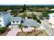 Aerial view of beach house, showcasing its roof and driveway at 4766 S Atlantic Ave, Ponce Inlet, FL 32127