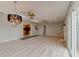 Open living area with hardwood floors and lots of natural light at 4766 S Atlantic Ave, Ponce Inlet, FL 32127